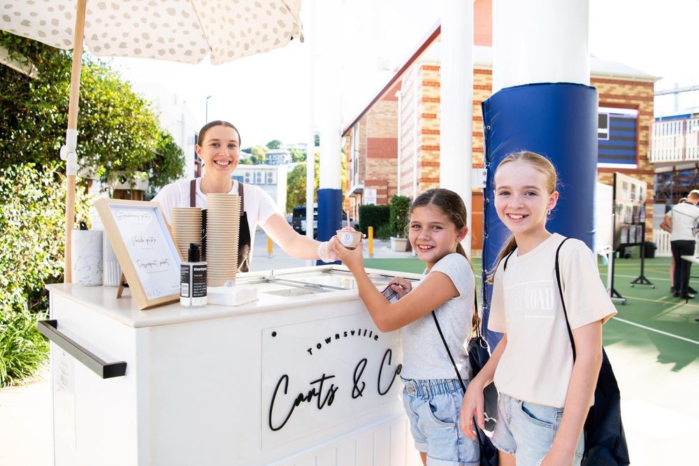 Children being served at the gelato cart