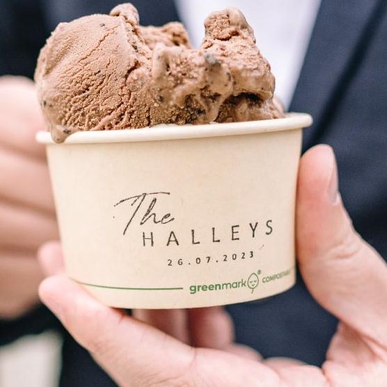 A gelato cup printed with a couple's name and their wedding date